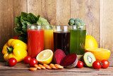 Fruit and vegetable juice in glasses and fresh fruits and 